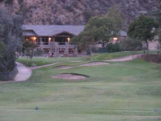 The first shot of the clubhouse from the 18th fairway (at the end of a late round).  